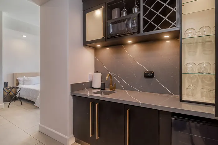 Master Suite B bar with wine glasses