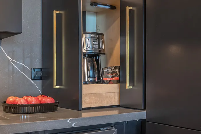 Coffee maker and hot water kettle station
