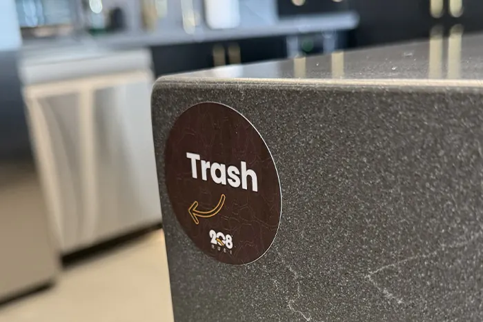 Labeled trash drawer in the kitchen