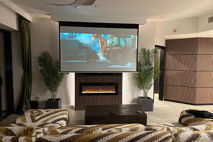 120-inch drop-down projector screen in the Rubi 208 living room