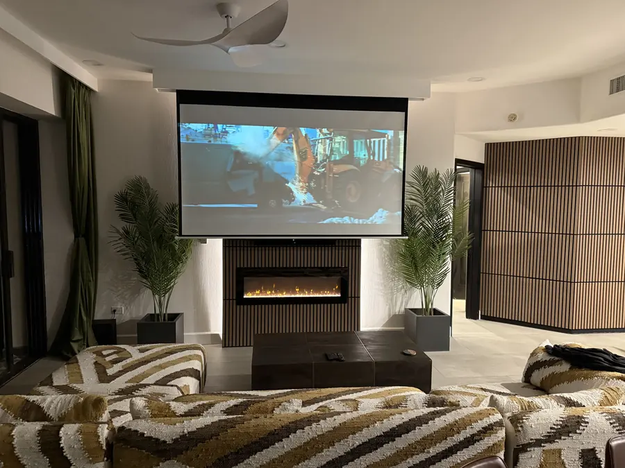 120-inch drop-down theater screen with a movie playing