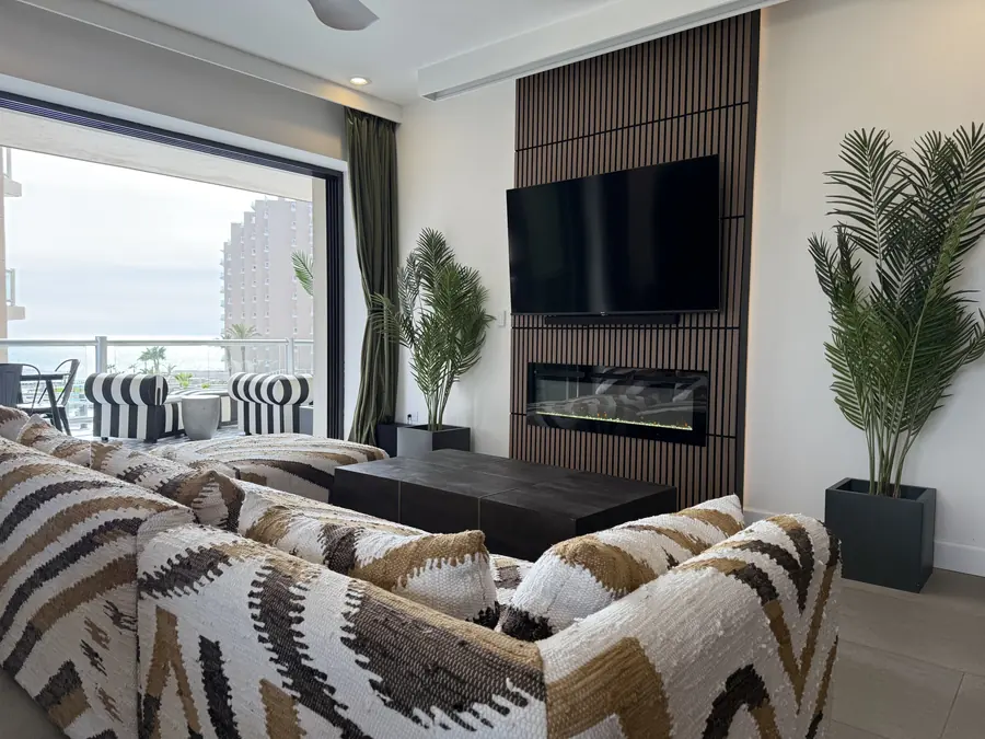 Living room opening to the patio